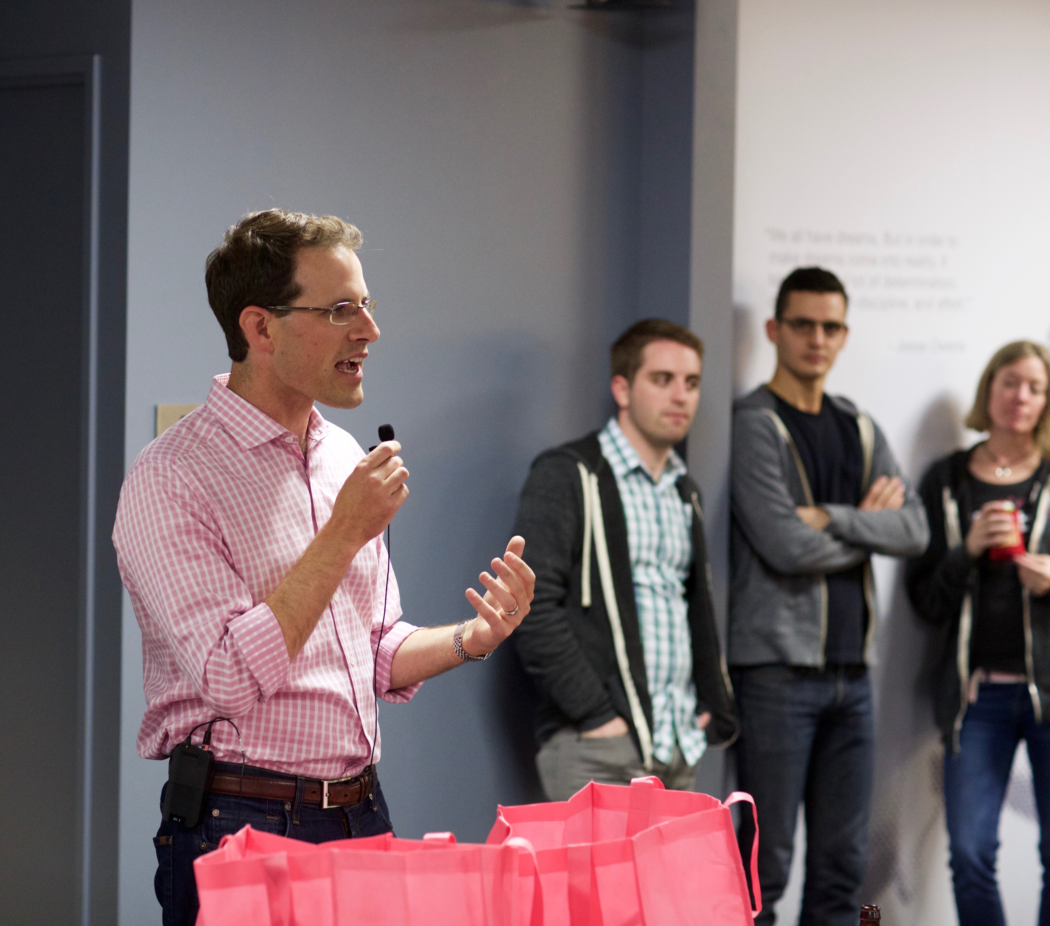 Founder and CEO, Bryan Leach speaks to employees in-office