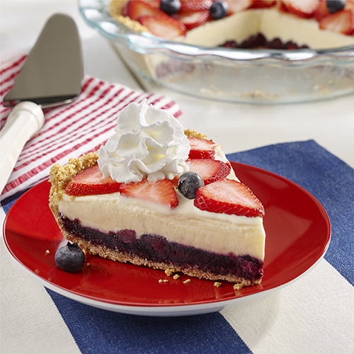 A slice of pie with blue, white, and red layers