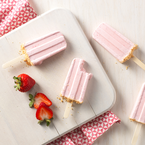Light pink strawberry popsicles
