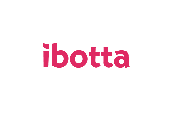 a yummy cake covered in treats. Save on goodies with Ibotta