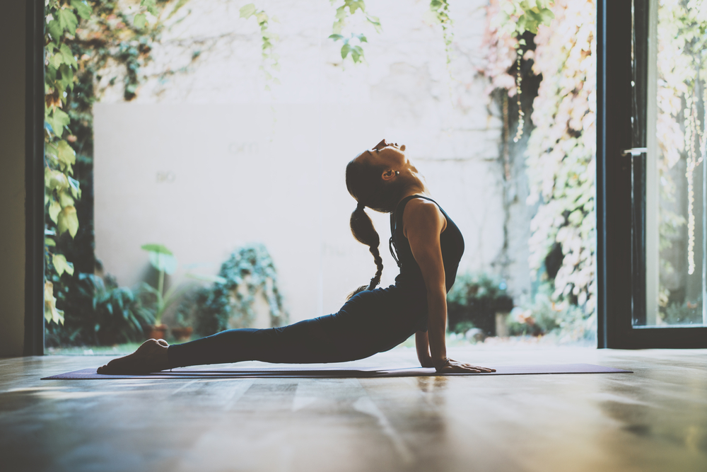 A woman enjoying a yoga pose