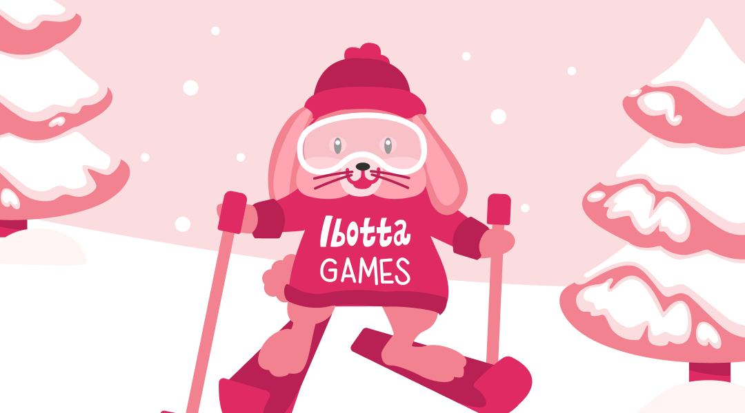 An illustrated pink rabbit wearing ski goggles and holding ski poles wears a pink shirt that states "Ibotta games"